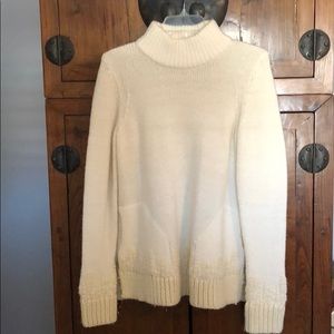 Anthropologie sleeping on snow turtleneck